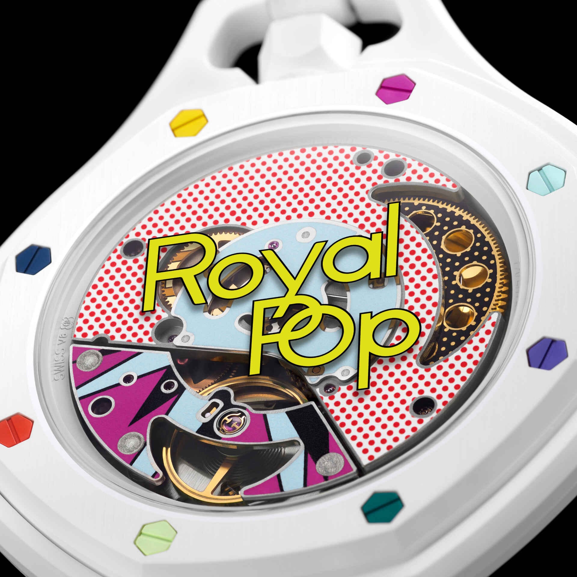 Détail lunette Royal Pop Huit Blanc — huit vis hexagonales multicolores en ordre aléatoire, lunette blanche, inscription Royal Pop