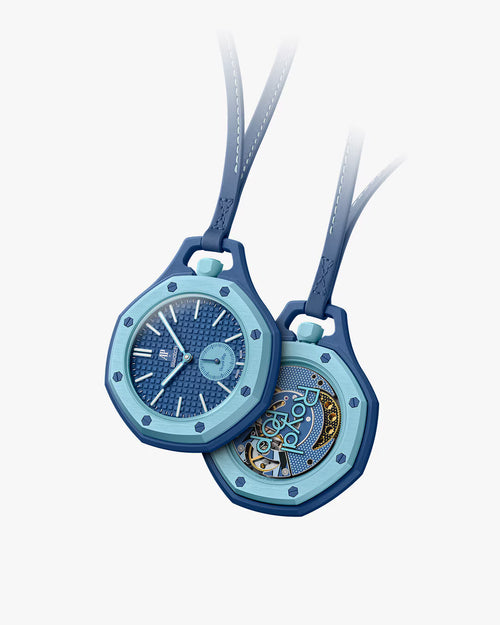 Royal Pop Làn Ba Swatch x Audemars Piguet — vue face et dos, boîtier Bioceramic bleu profond, lunette bleu clair, sous-cadran petite seconde, fond saphir Pop Art, cordon cuir bleu